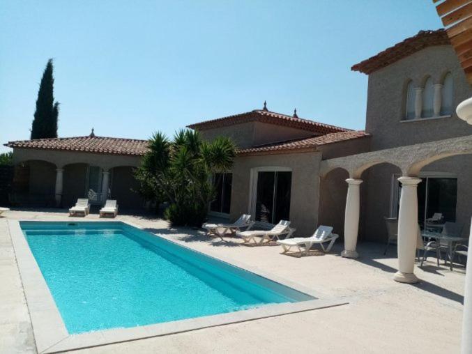 Bienvenue A L Hacienda Villa Magalas Exterior photo